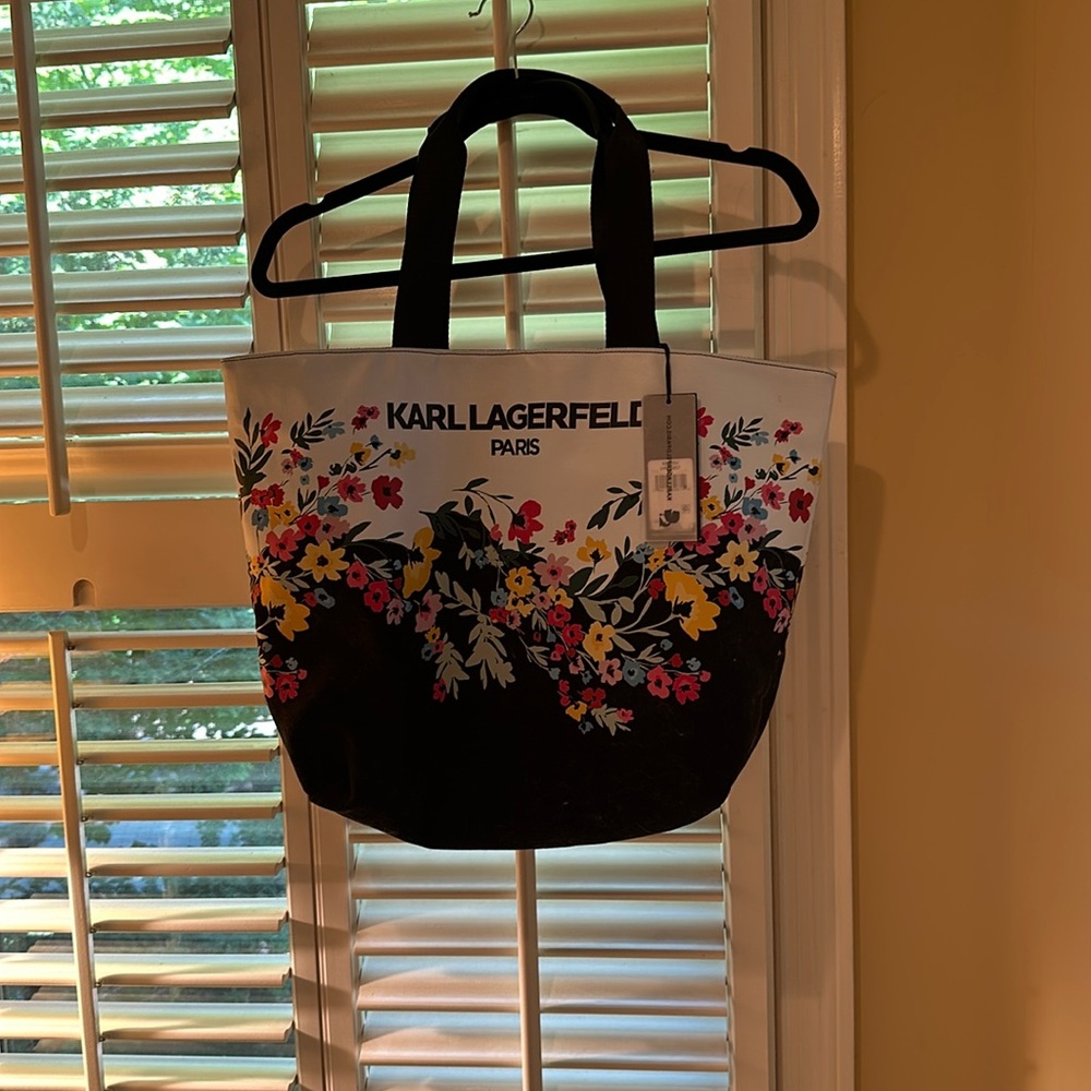 This is a rare find a Karl  Lagerfeld  Paris black flower bag brand new with tag